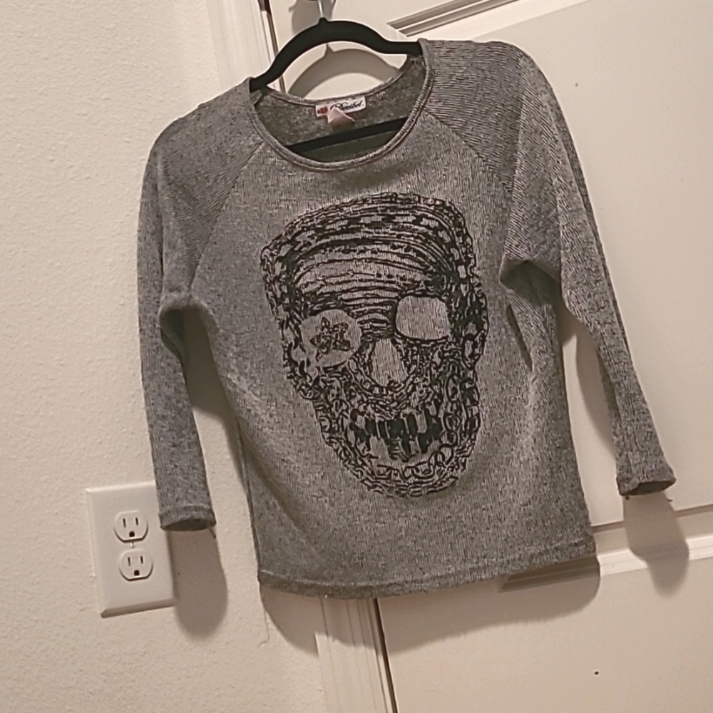 Grey mesh half sleeve skull shirt.